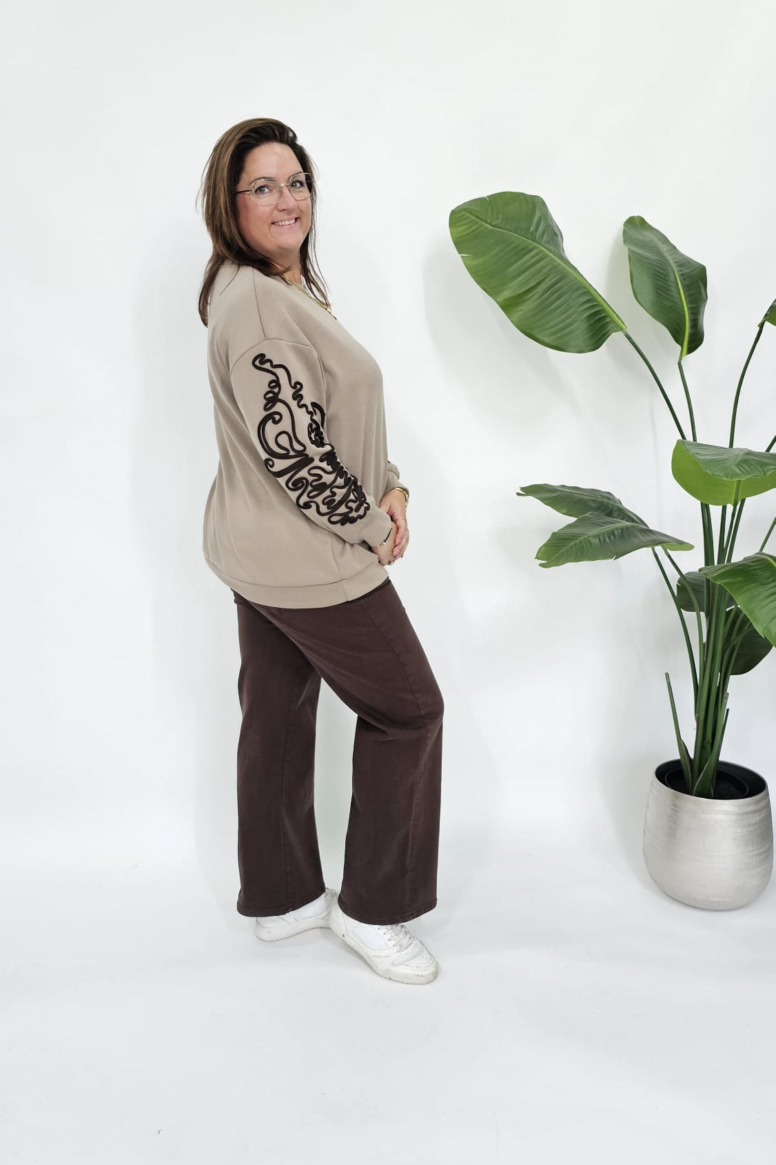 SWEATER MET SIERKOORD MOUW BEIGE