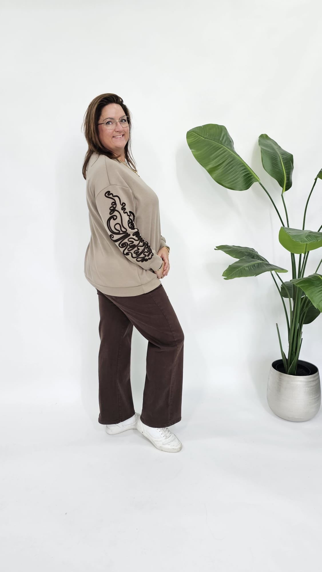 SWEATER MET SIERKOORD MOUW BEIGE
