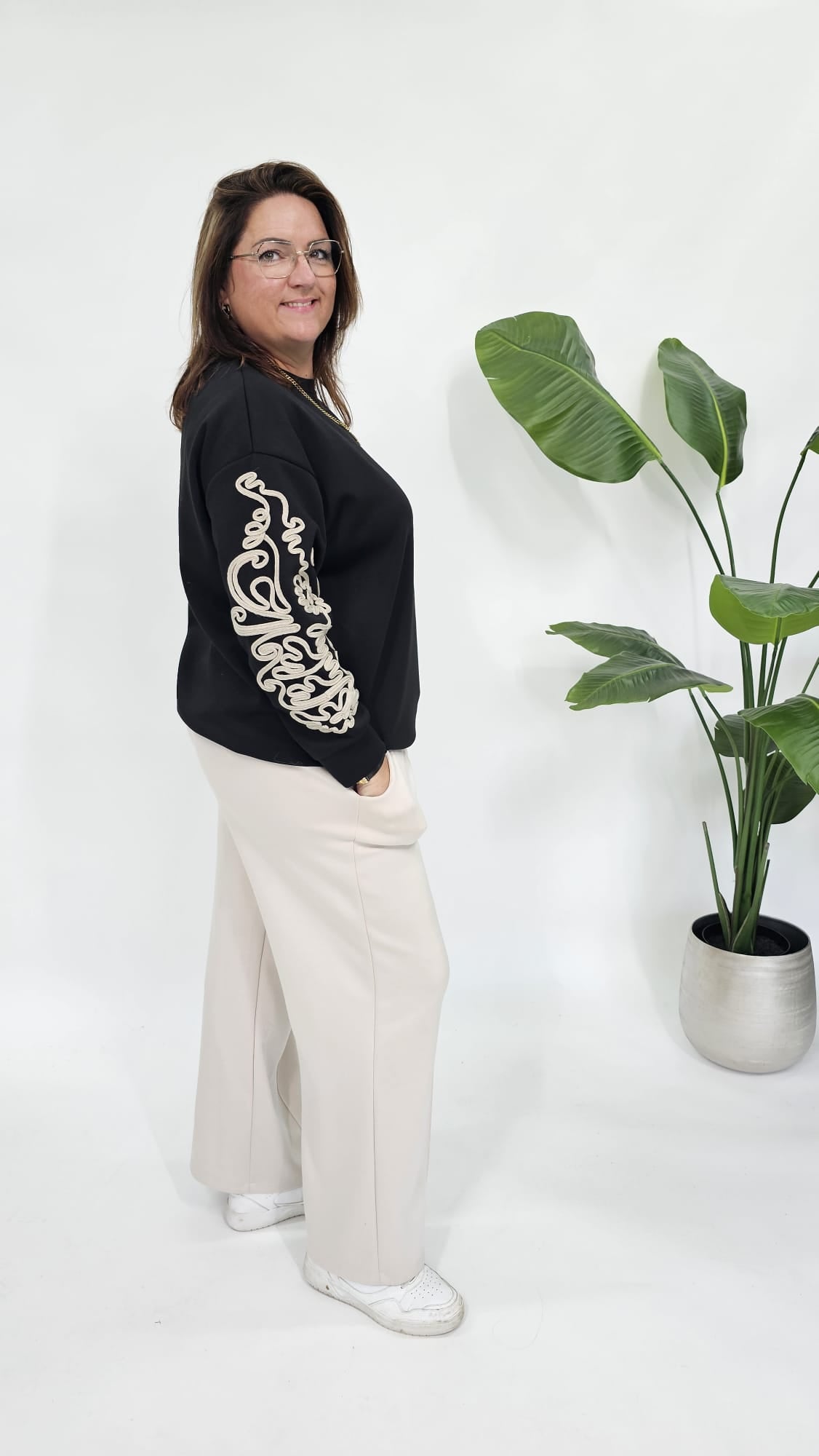 SWEATER MET SIERKOORD MOUW ZWART