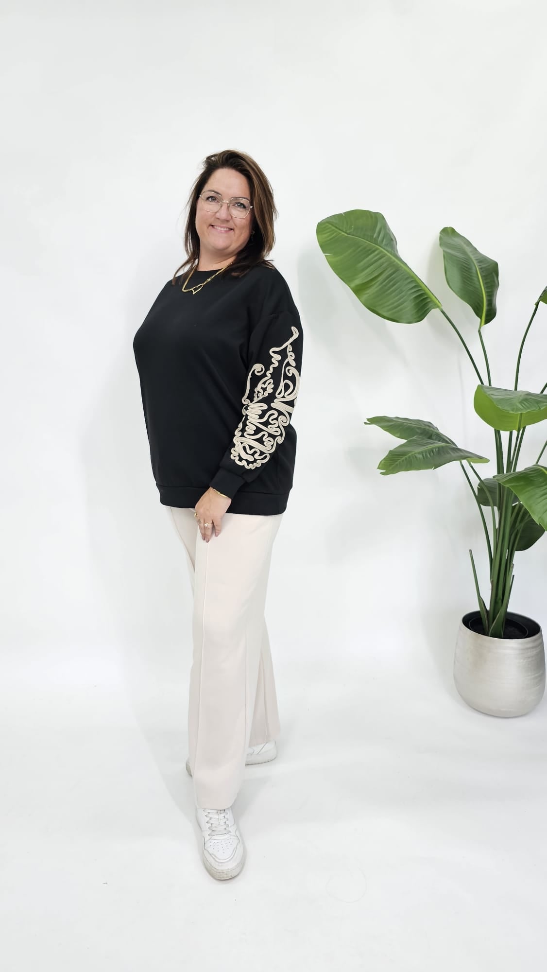 SWEATER MET SIERKOORD MOUW ZWART